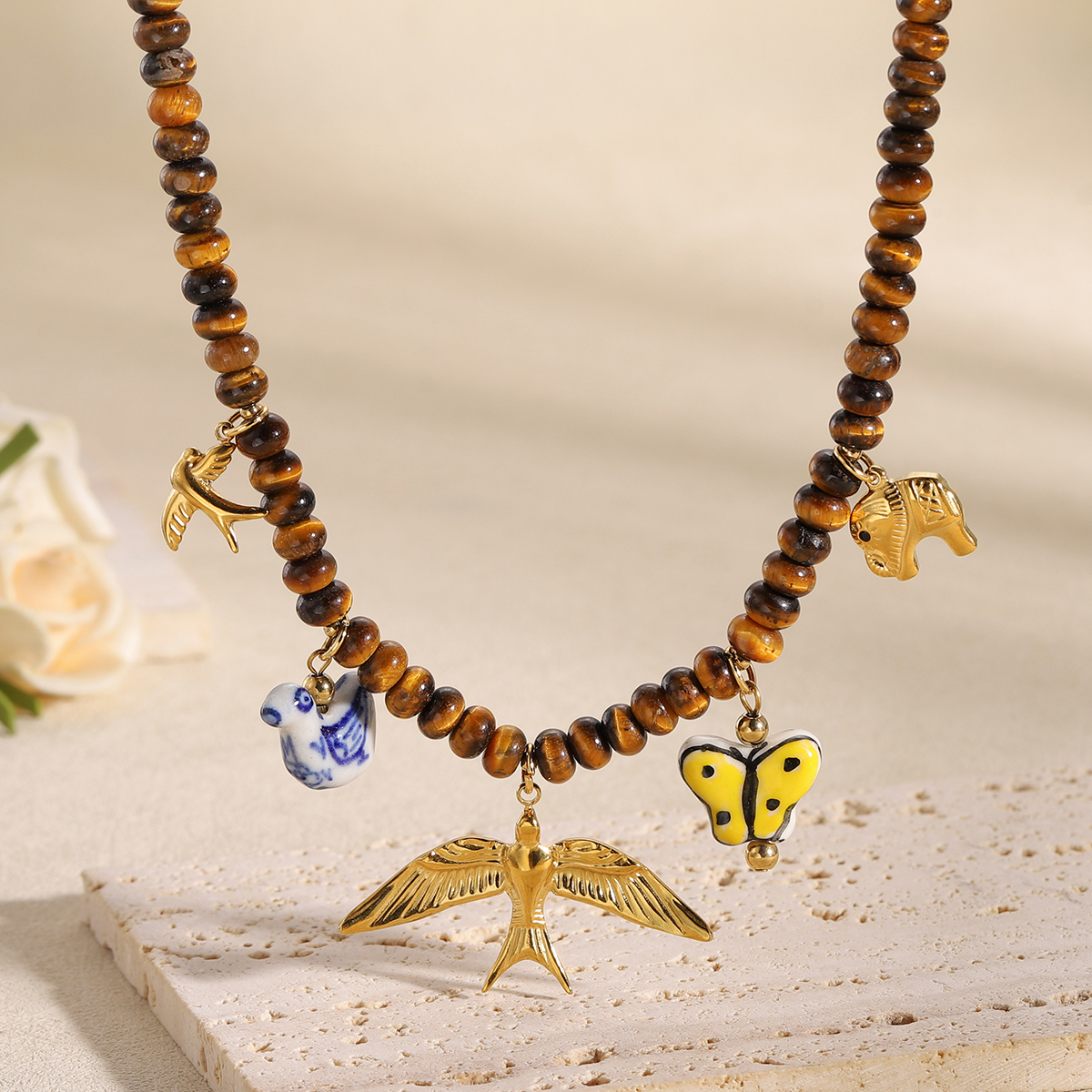 Vintage Multi Animal Charm Tig - đánh giá và giá Butterfly Clasp Deployant