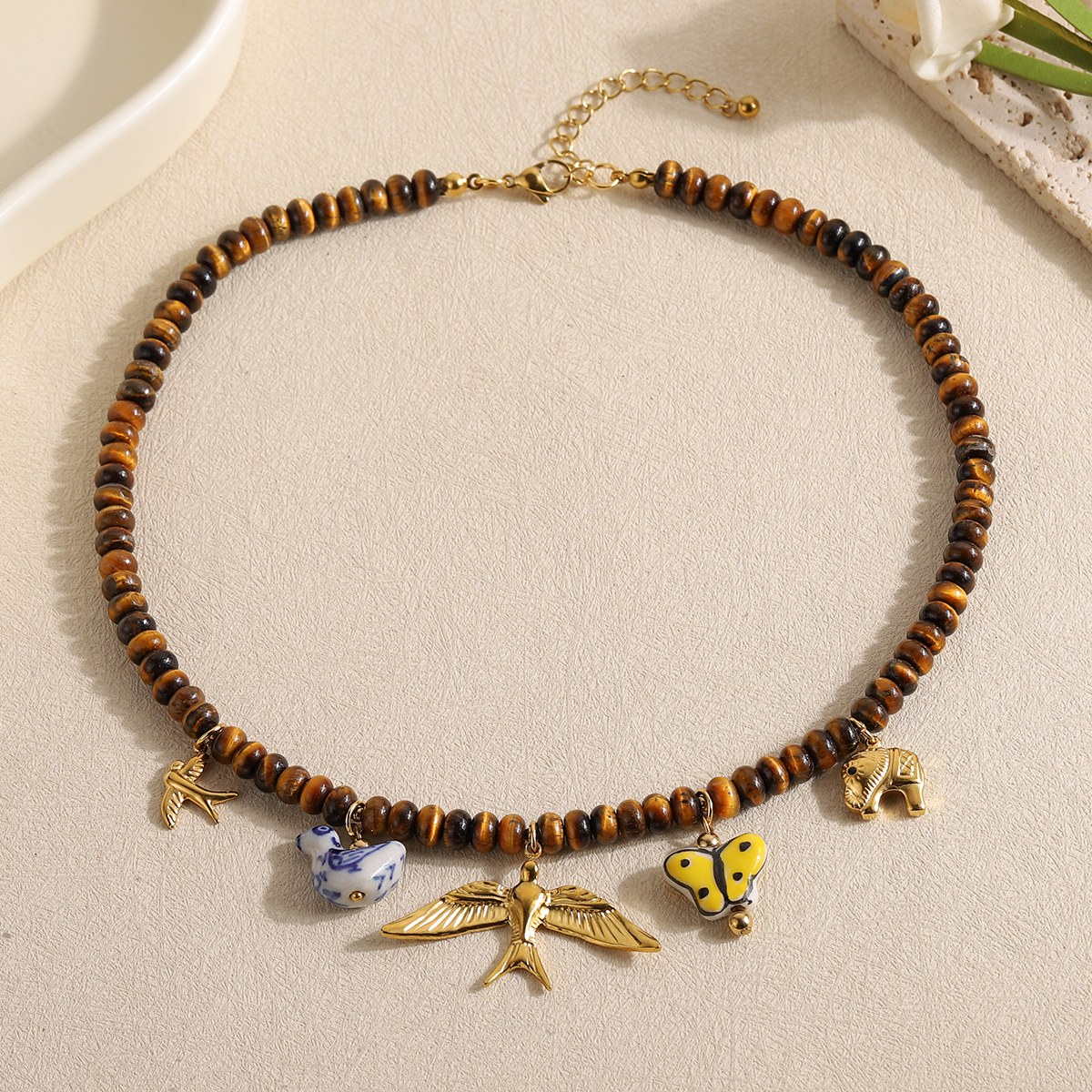 Vintage Multi Animal Charm Tig - đánh giá và giá Butterfly Clasp Deployant