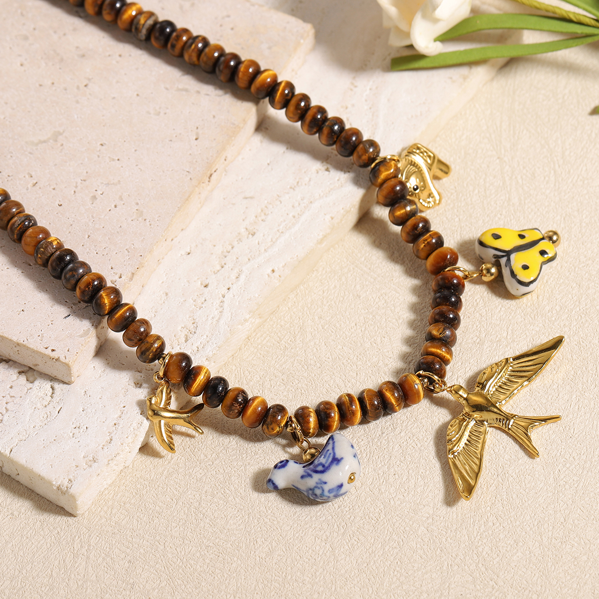 Vintage Multi Animal Charm Tig - đánh giá và giá Butterfly Clasp Deployant